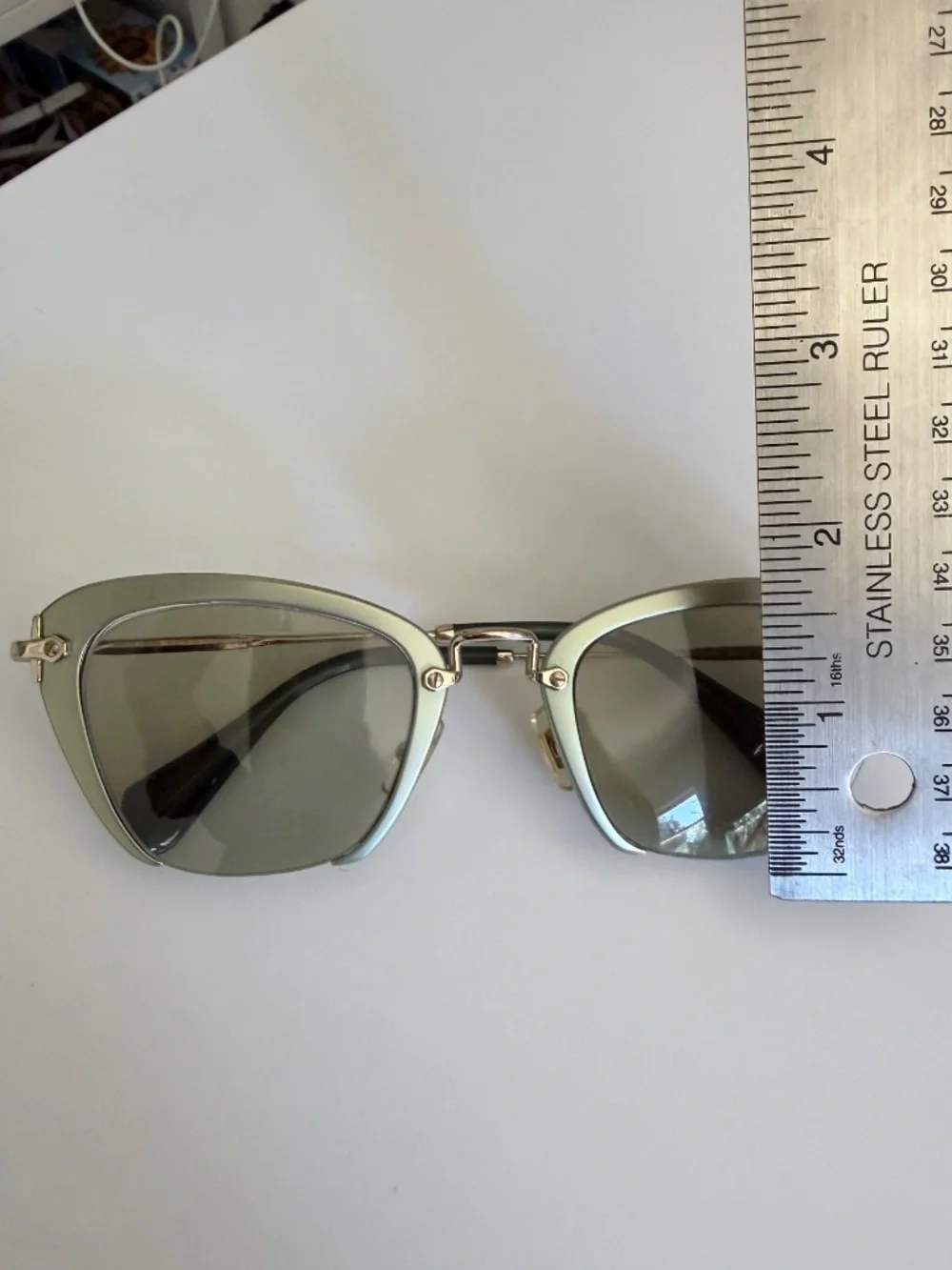 Miu Miu Sage Green Cats Eye Metal Frame Glasses Gold Hardware Modern Lightweight